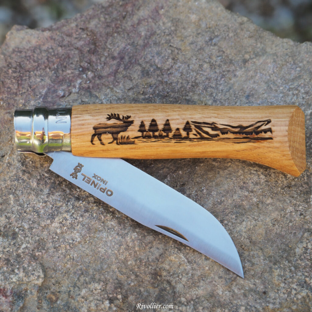 Opinel gravé cerf brame roche